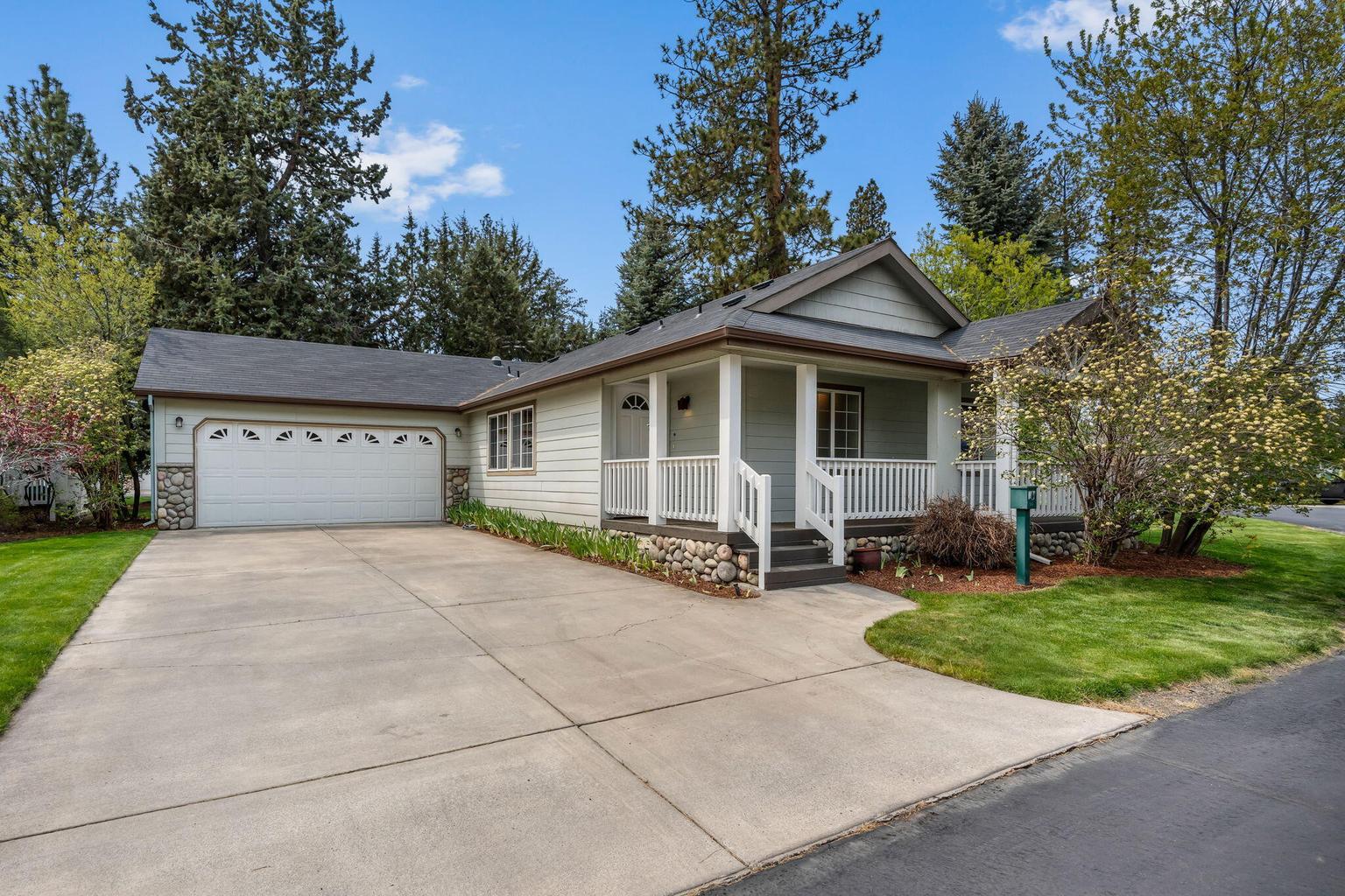 Large driveway with double garage.