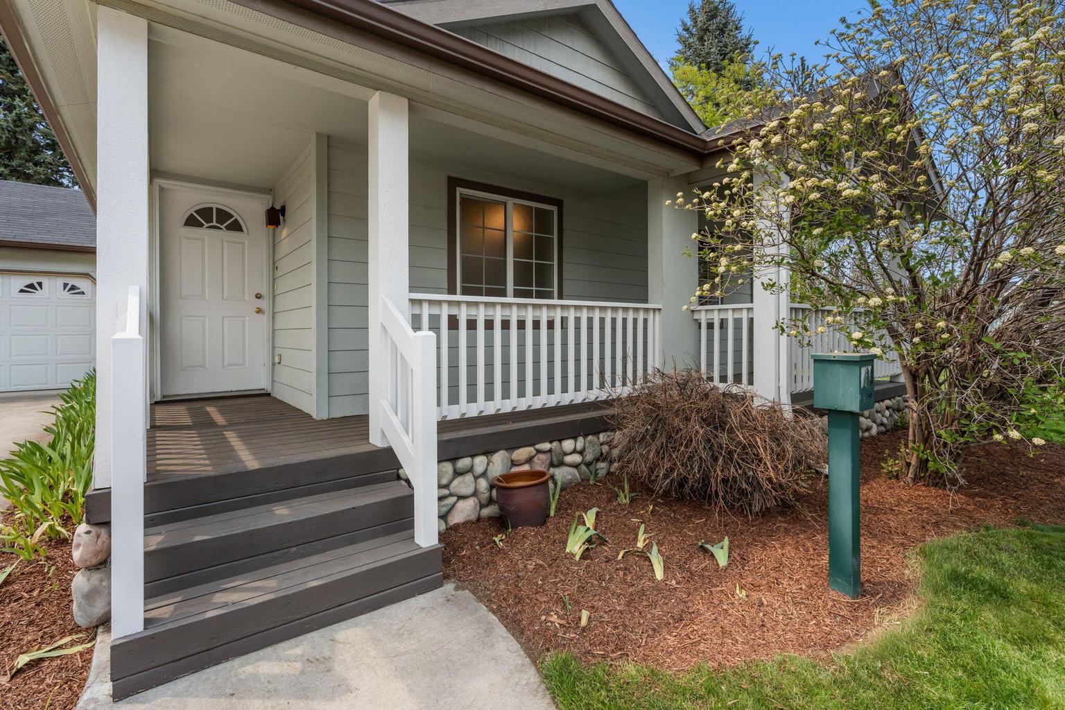 Front entry and covered deck.