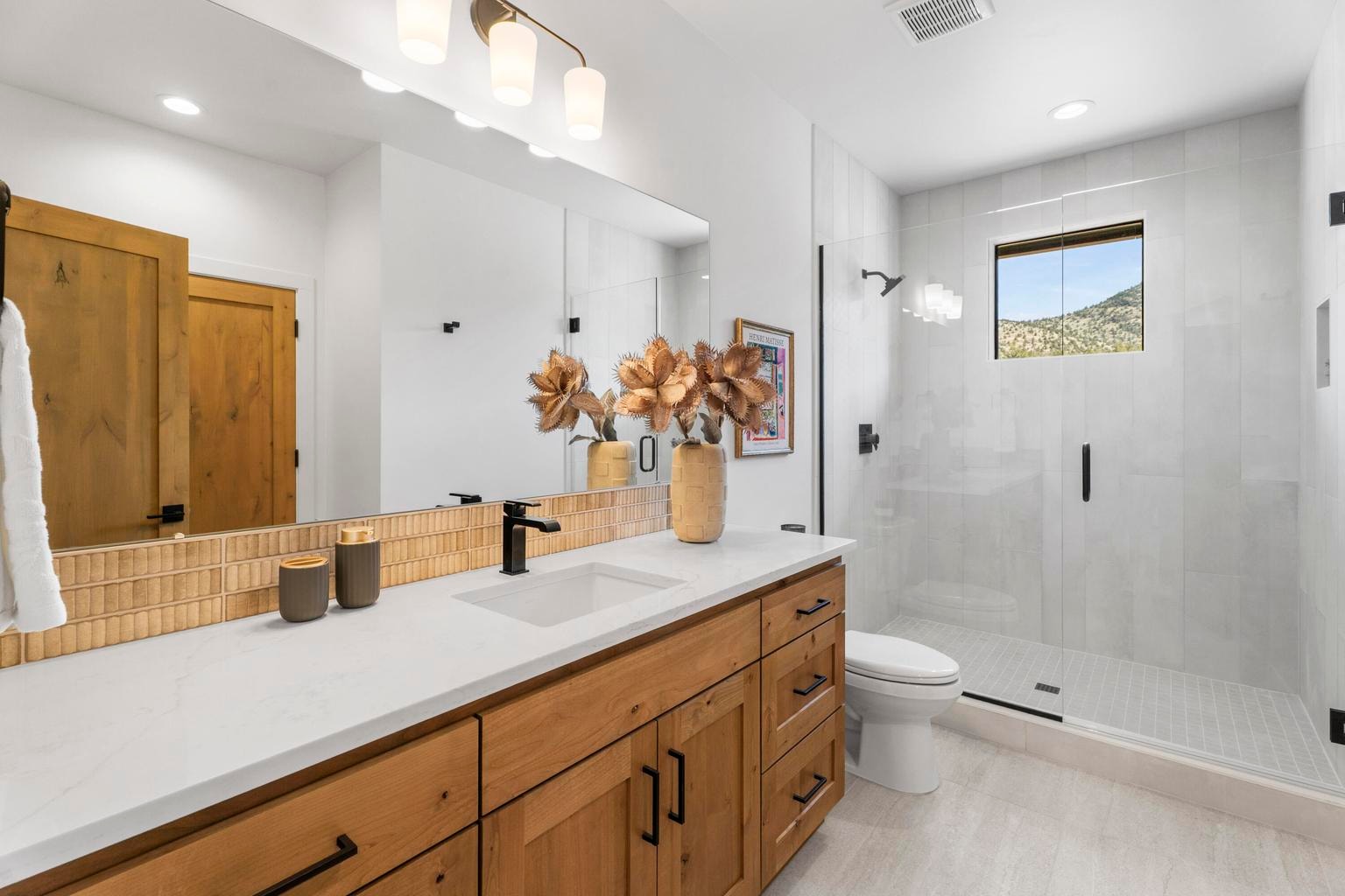 The ground floor offers a full bathroom for overnight guests and day visitors alike