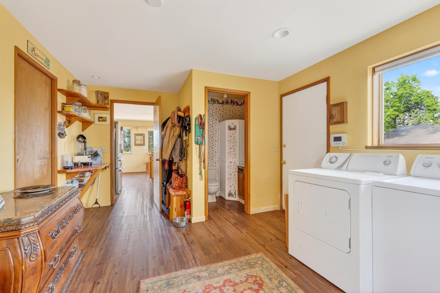 Includes half bath and pantry.