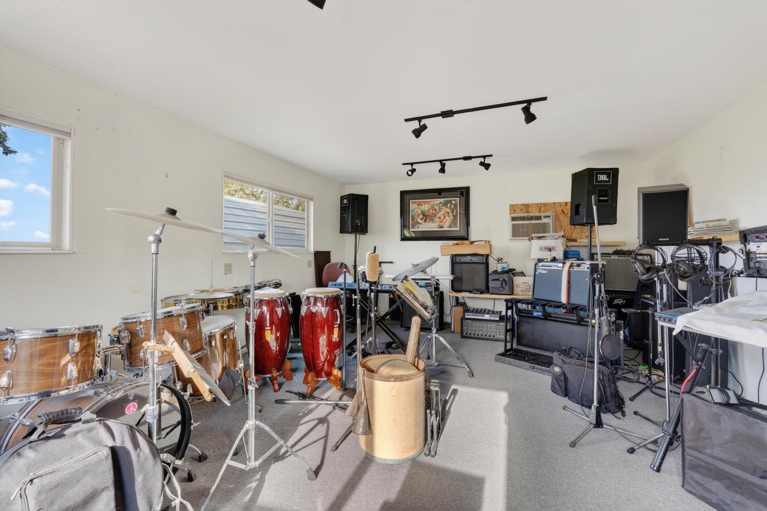 Attached to 2-car garage. Can be used as music room, workout room, or office for a remote worker.