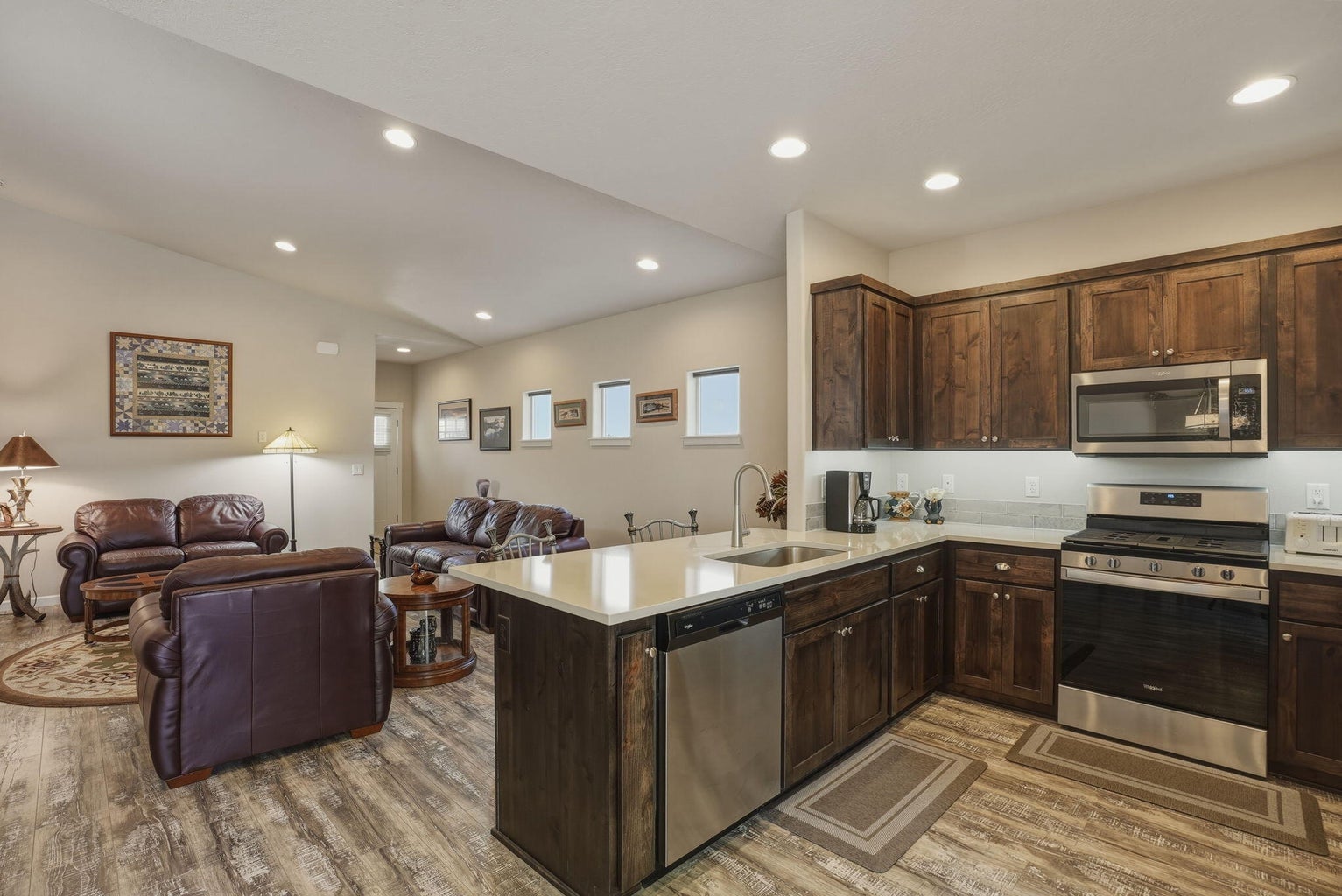 Breakfast bar, stainless appliances, and pantry