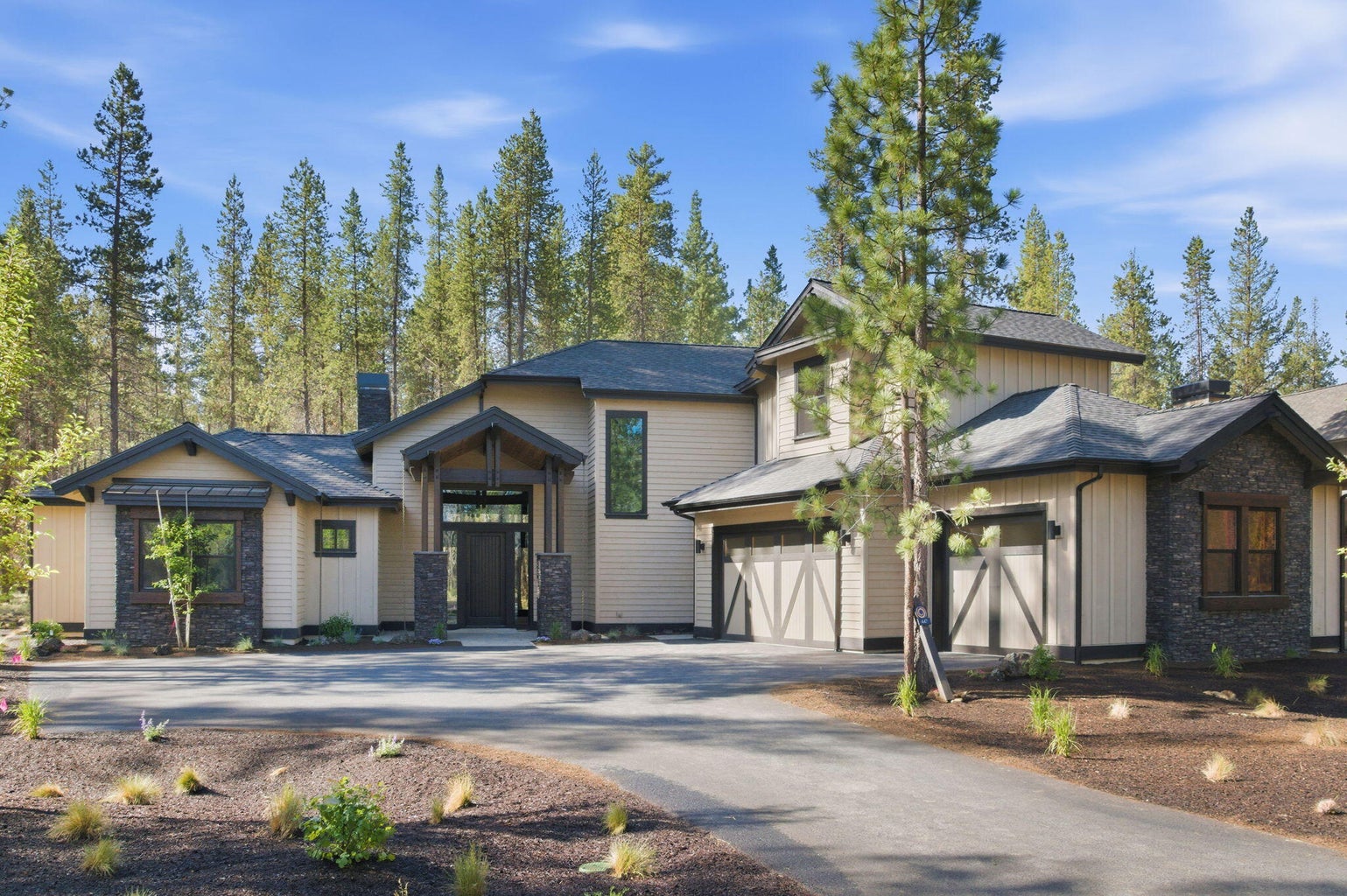 Three car garage, electric plug-in and third bay walled off for owner lock-off