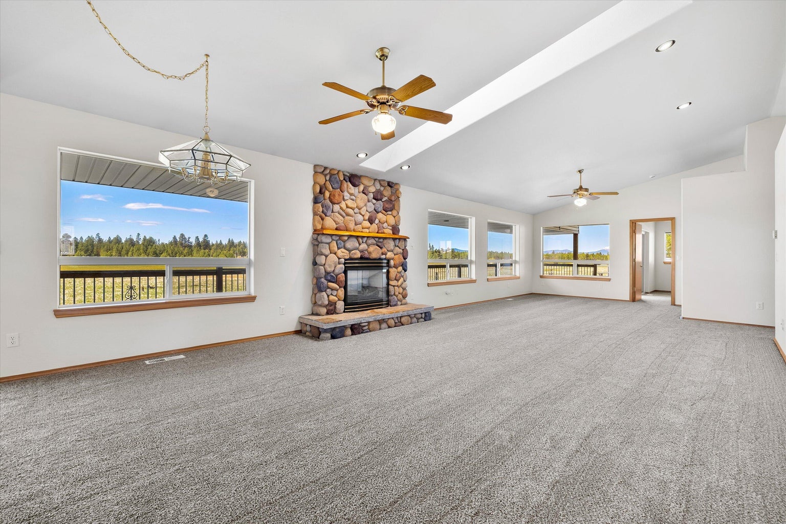 Big open great room with views of the wetlands and mountains