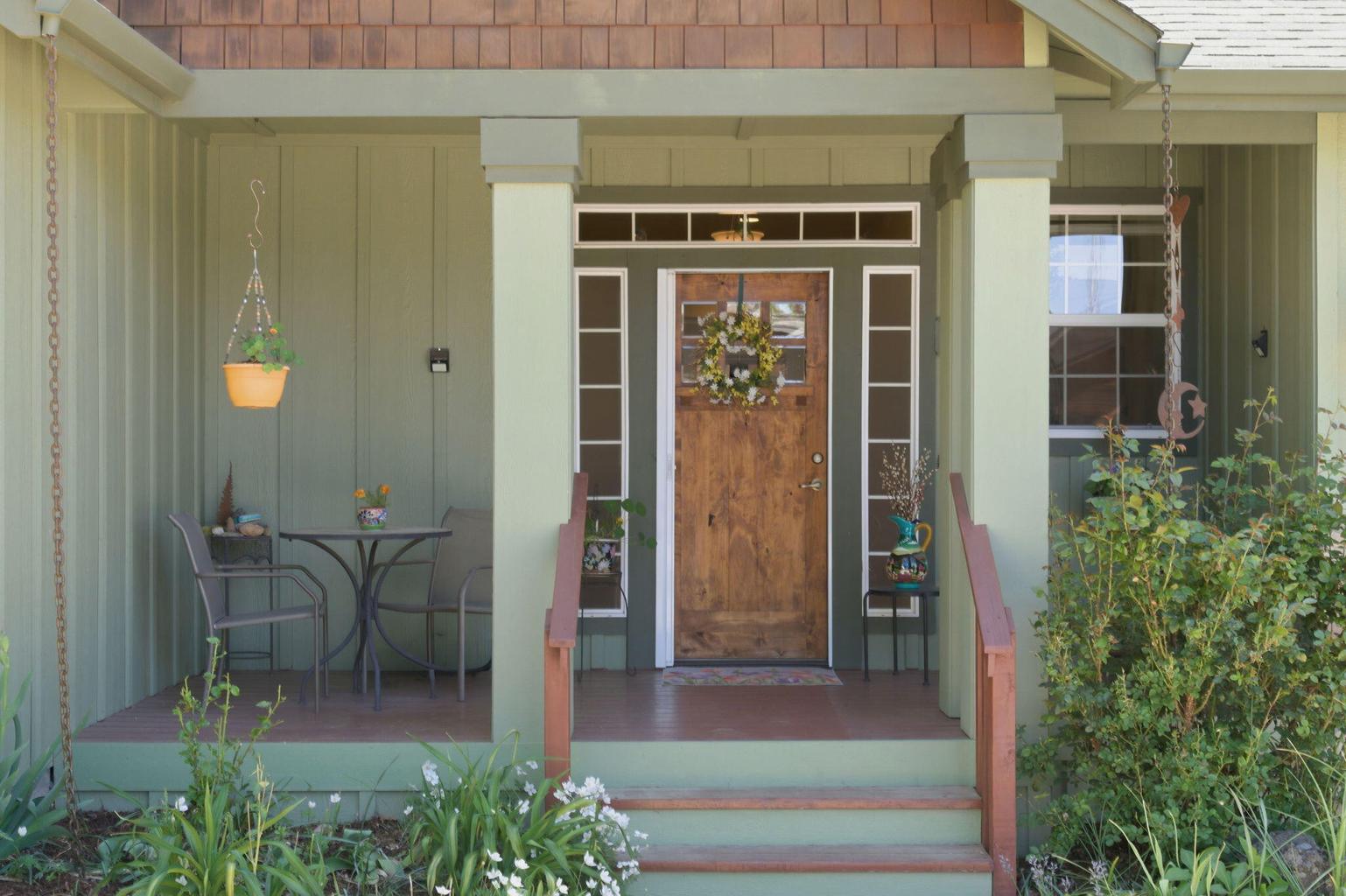 Covered front porch and inviting entrance.
