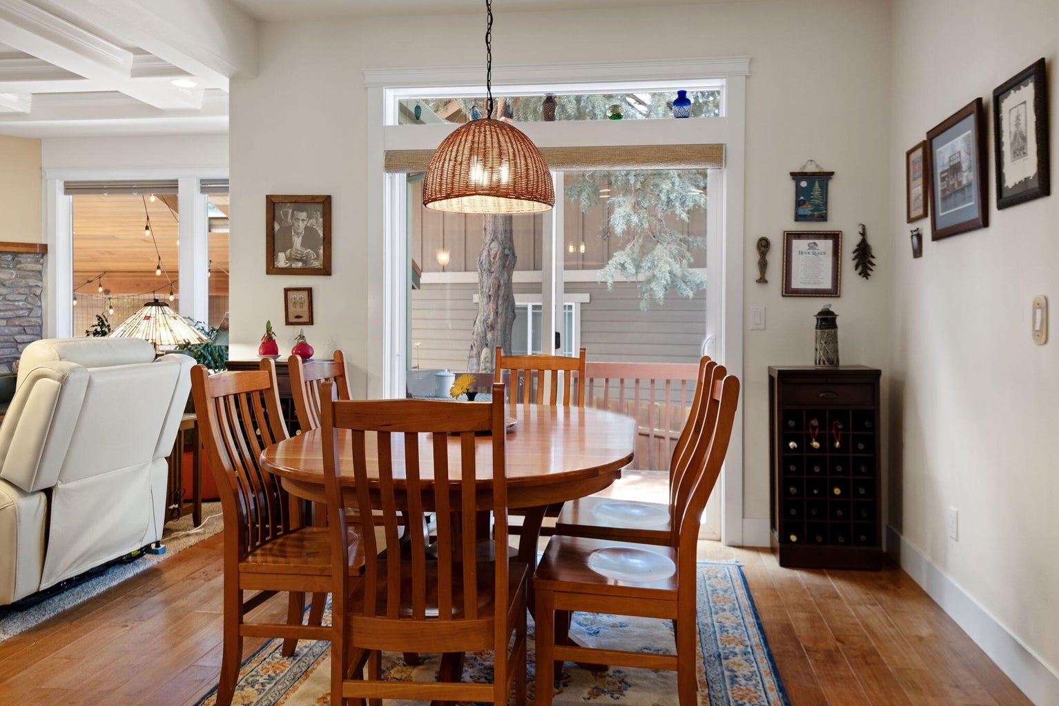 Great room concept with hardwood floors and spacious dining area.