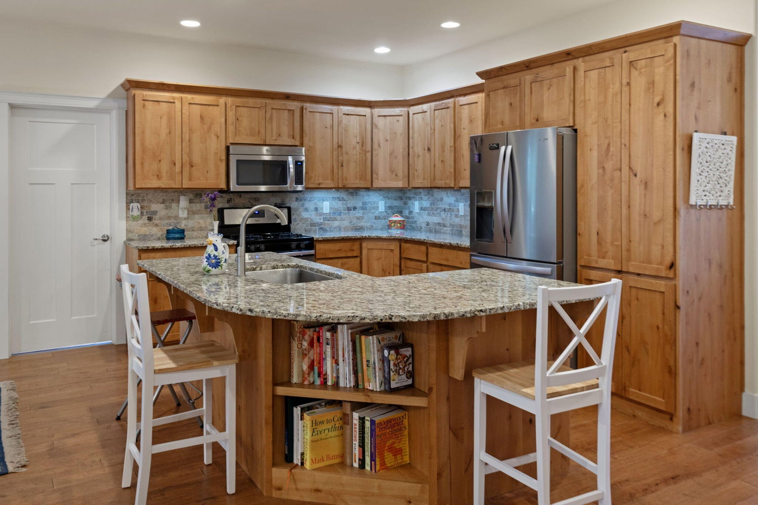 Thoughtfully designed kitchen with eating bar.