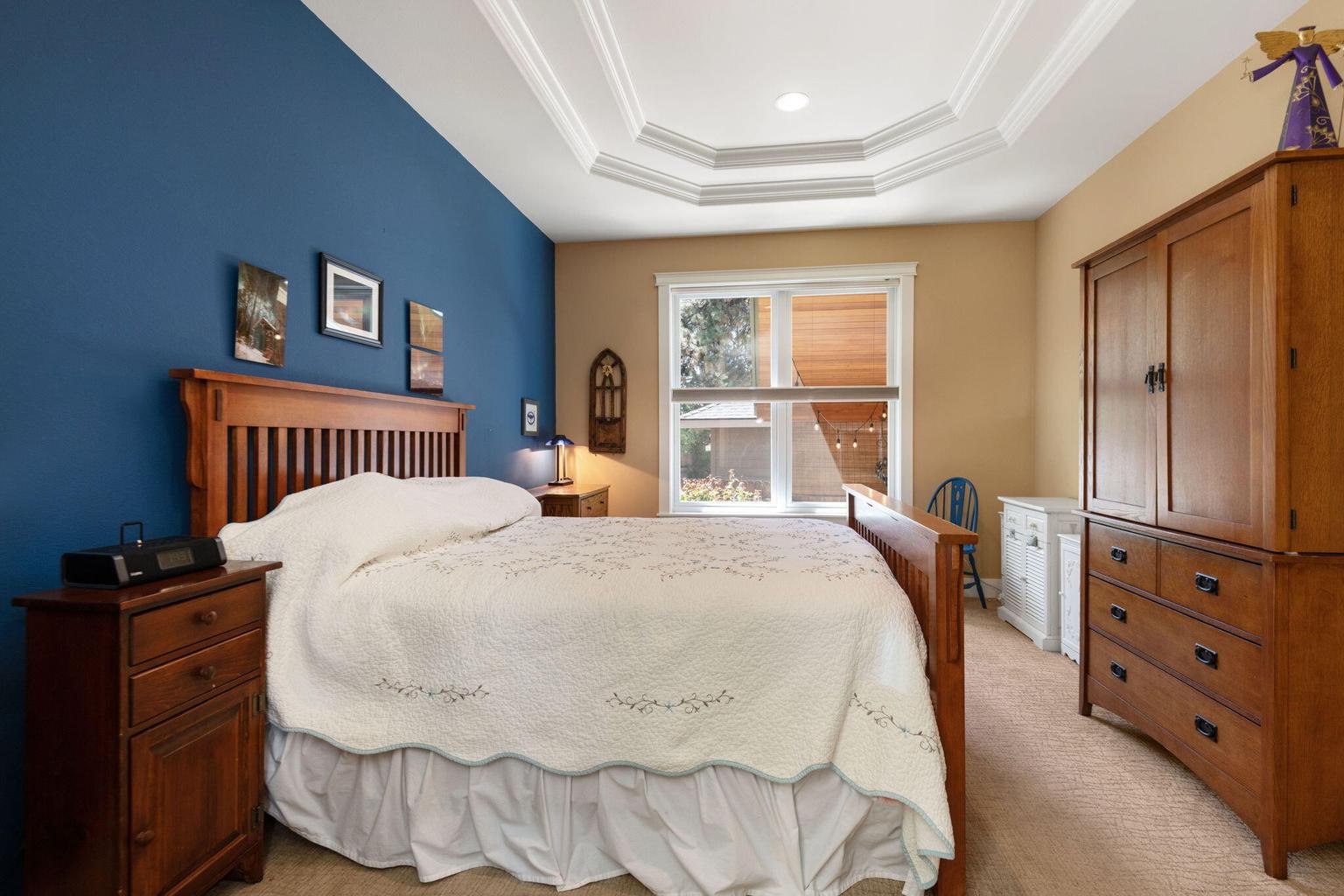 Grand primary suite with newer Anderson window.