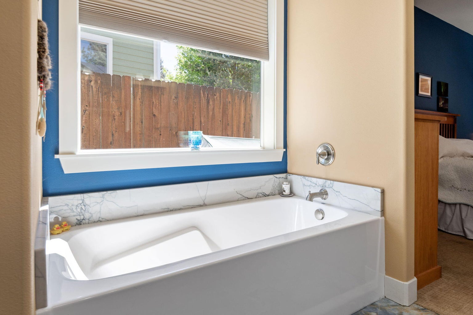 Large soaking tub in the primary suite.
