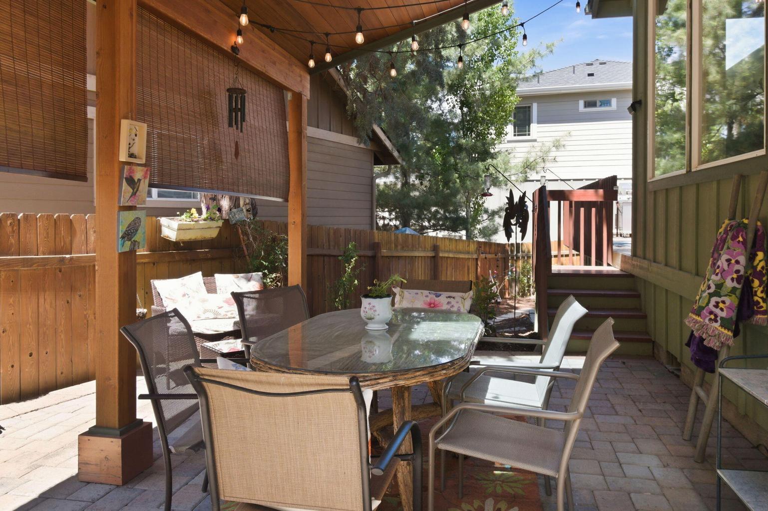 Fully fenced yard and custom pergola.