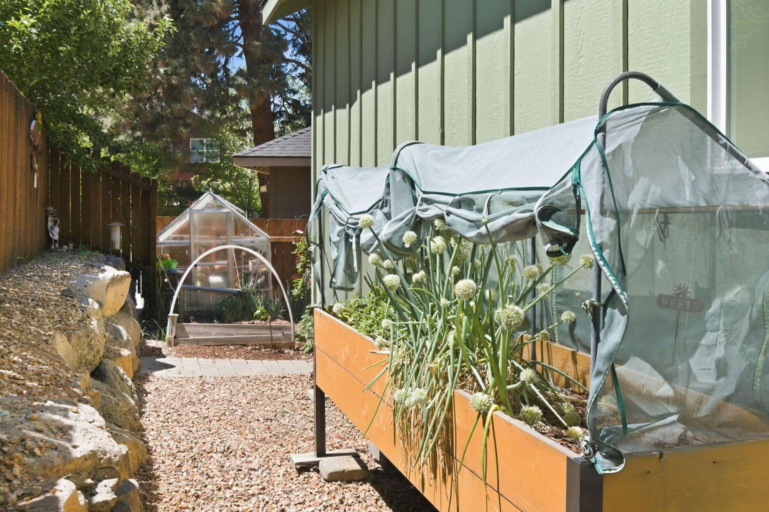 Herb garden, greenhouse, flower beds.... a gardener's dream.