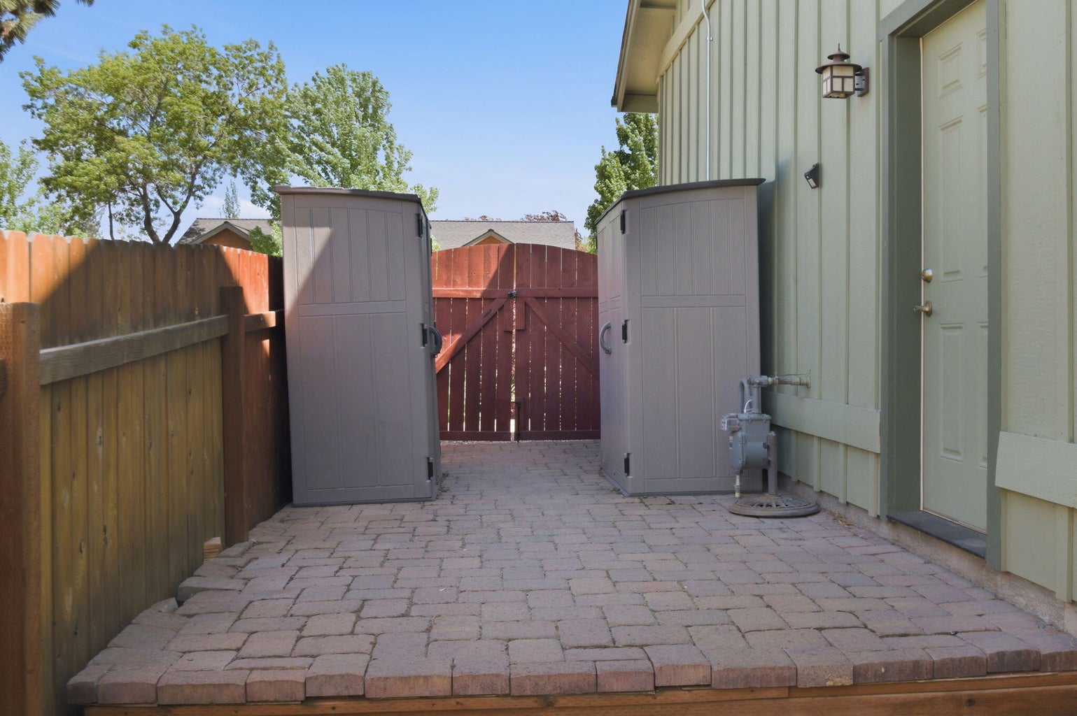 Extra storage, pavers throughout, and a separate dog run.
