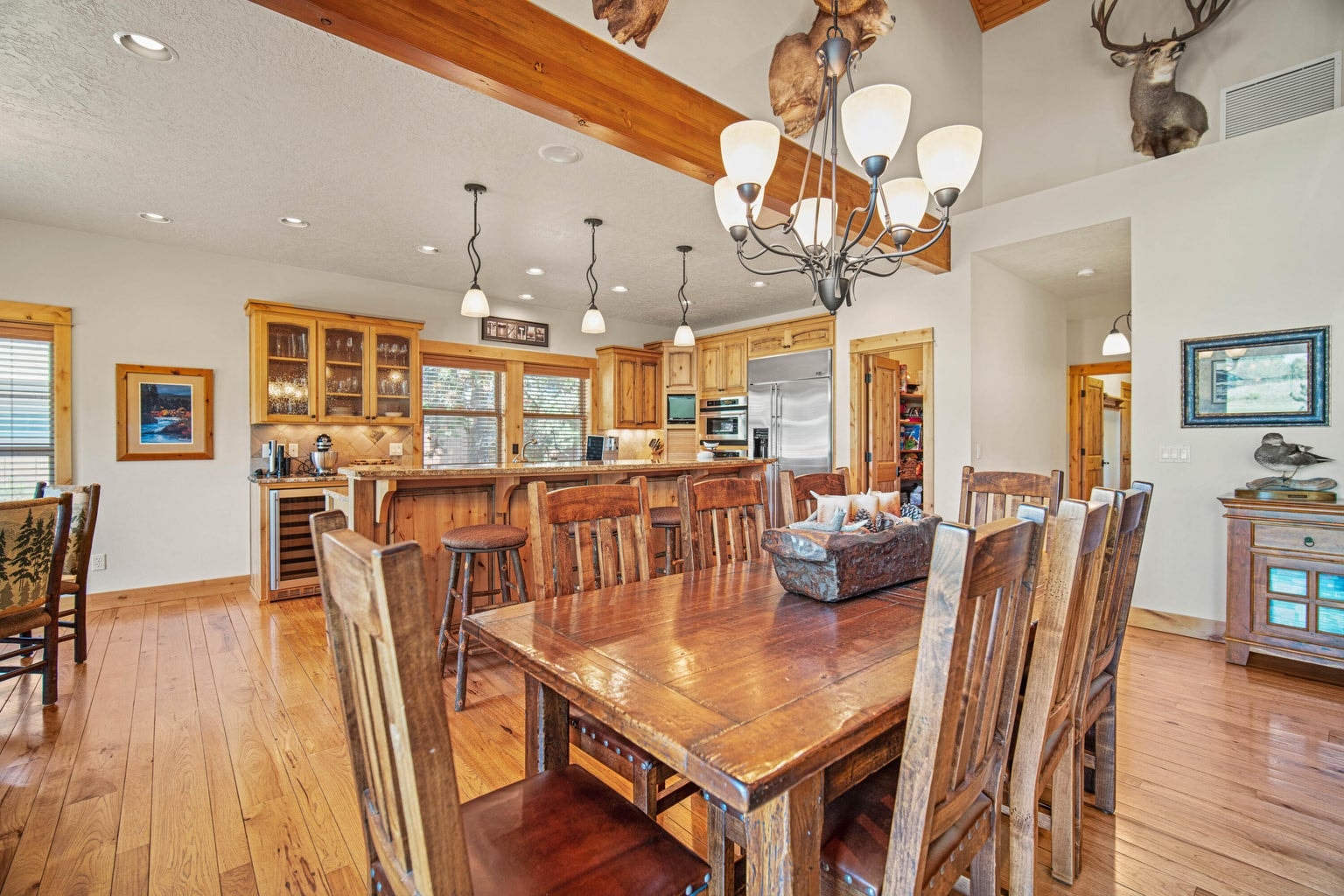 Dining and kitchen spaces flow easily from the great room, supporting everyday comfort and resort-style hosting.