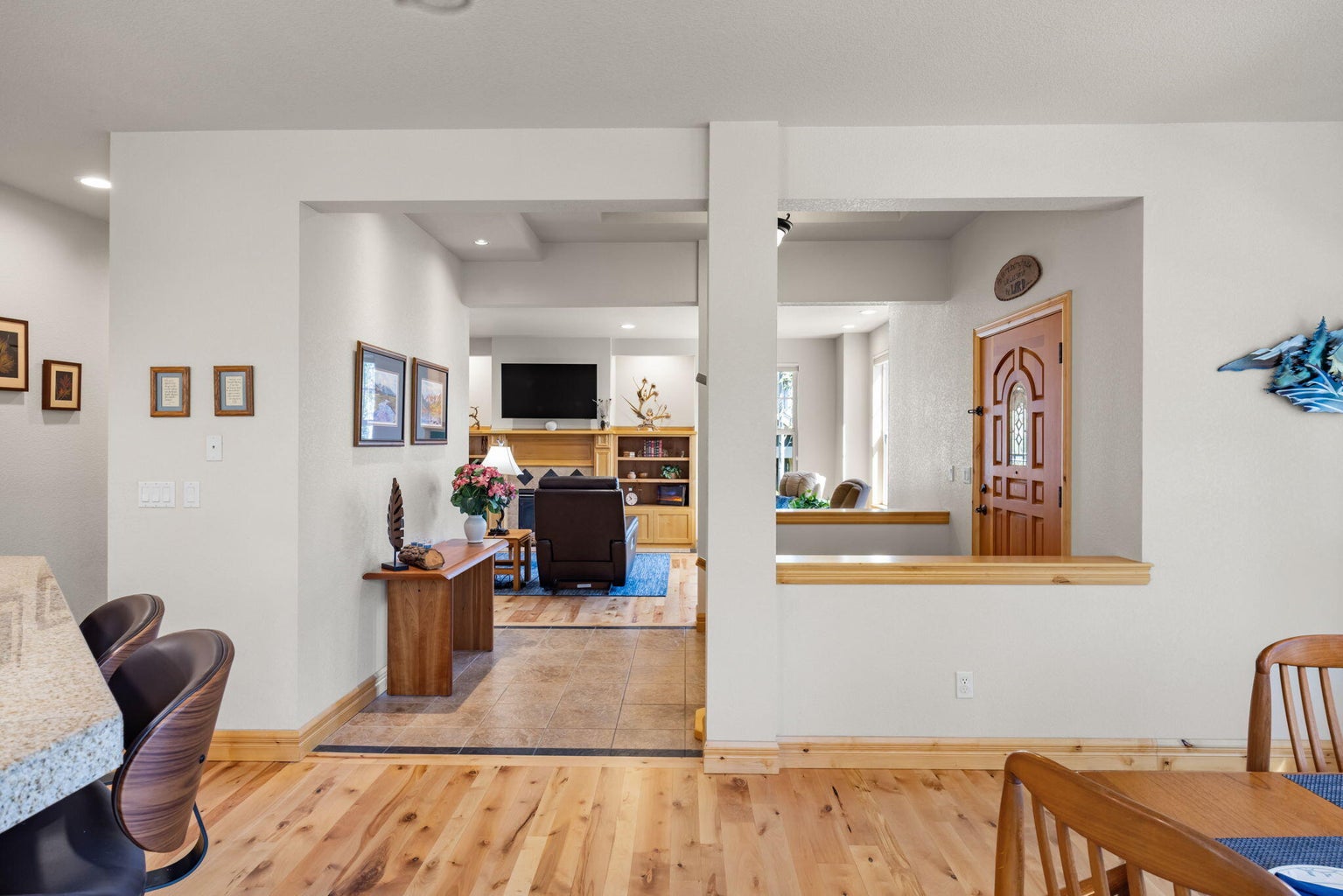 Looking from dining room across foyer into living room