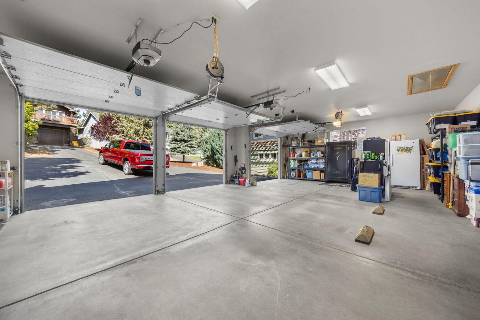 Oversized, triple garage. 2 doors have MyQ garage door openers.