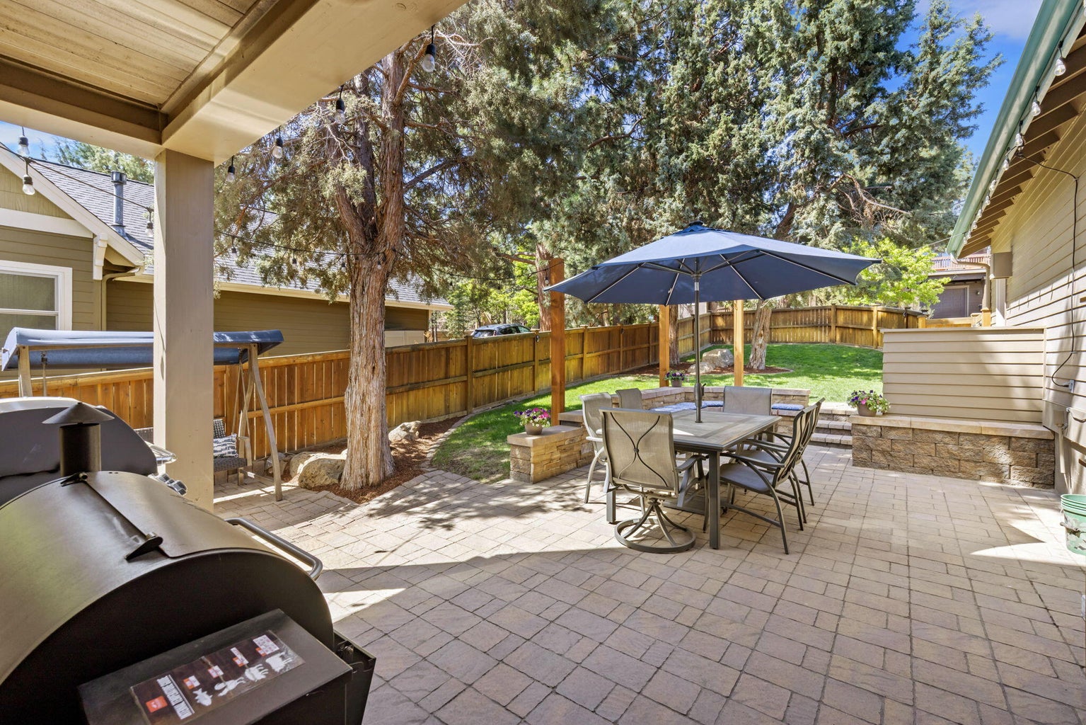 Paver patio in backyard