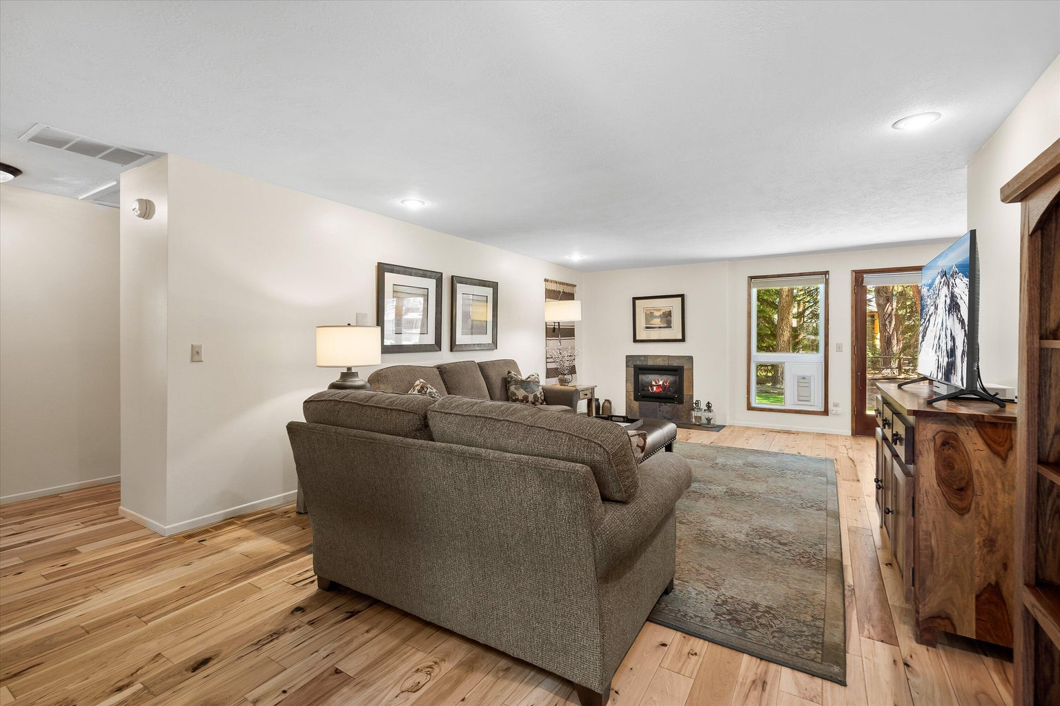 Gorgeous hickory flooring throughout the home