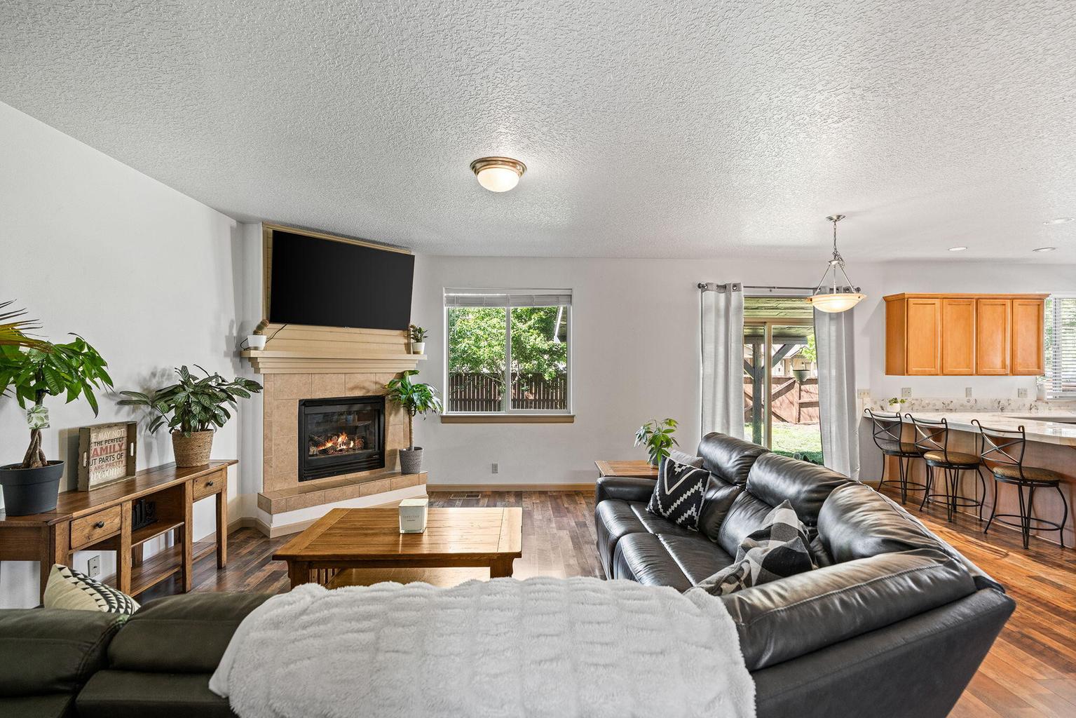 open living area to kitchen
