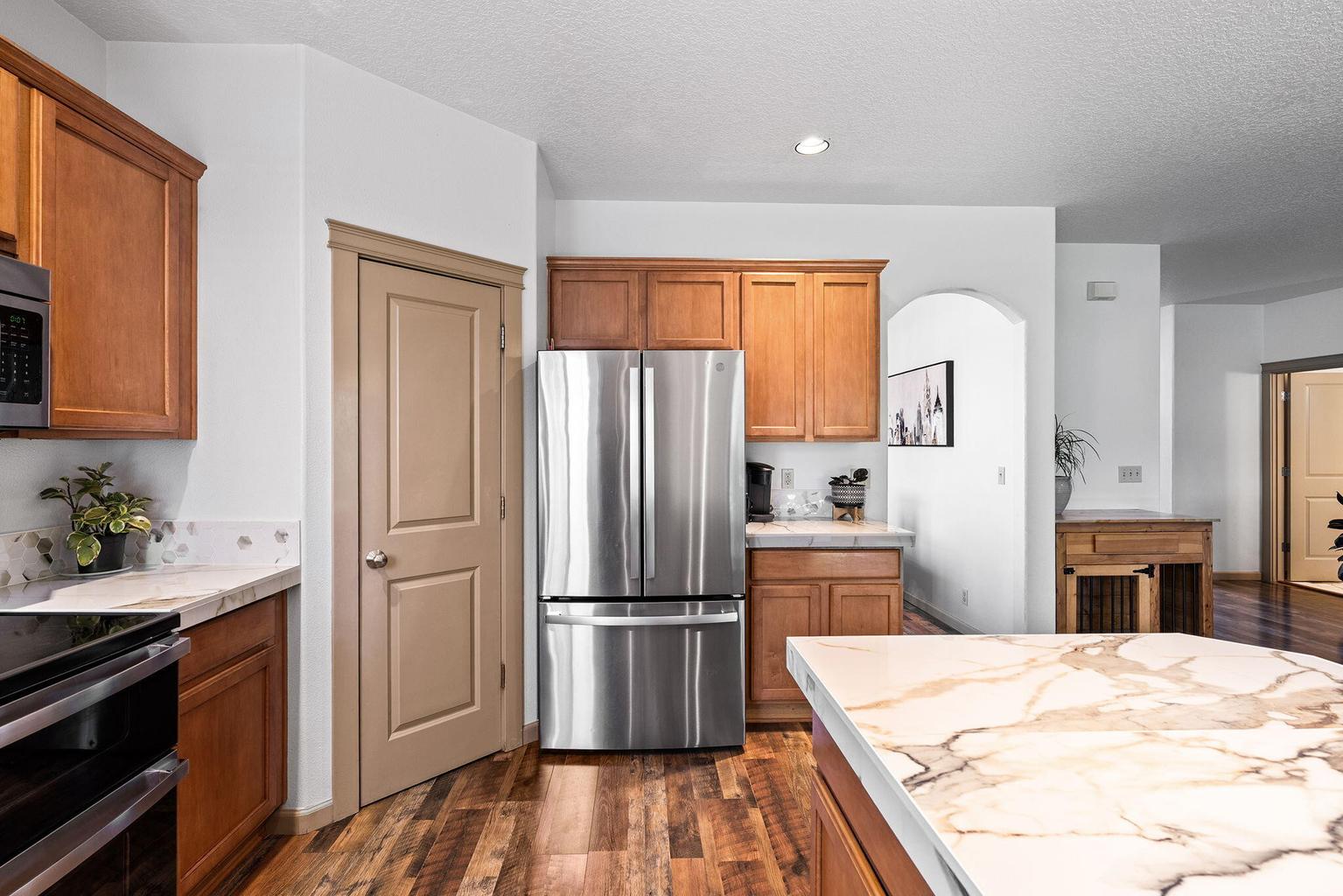 spacious kitchen, lots of storage and walk in pantry