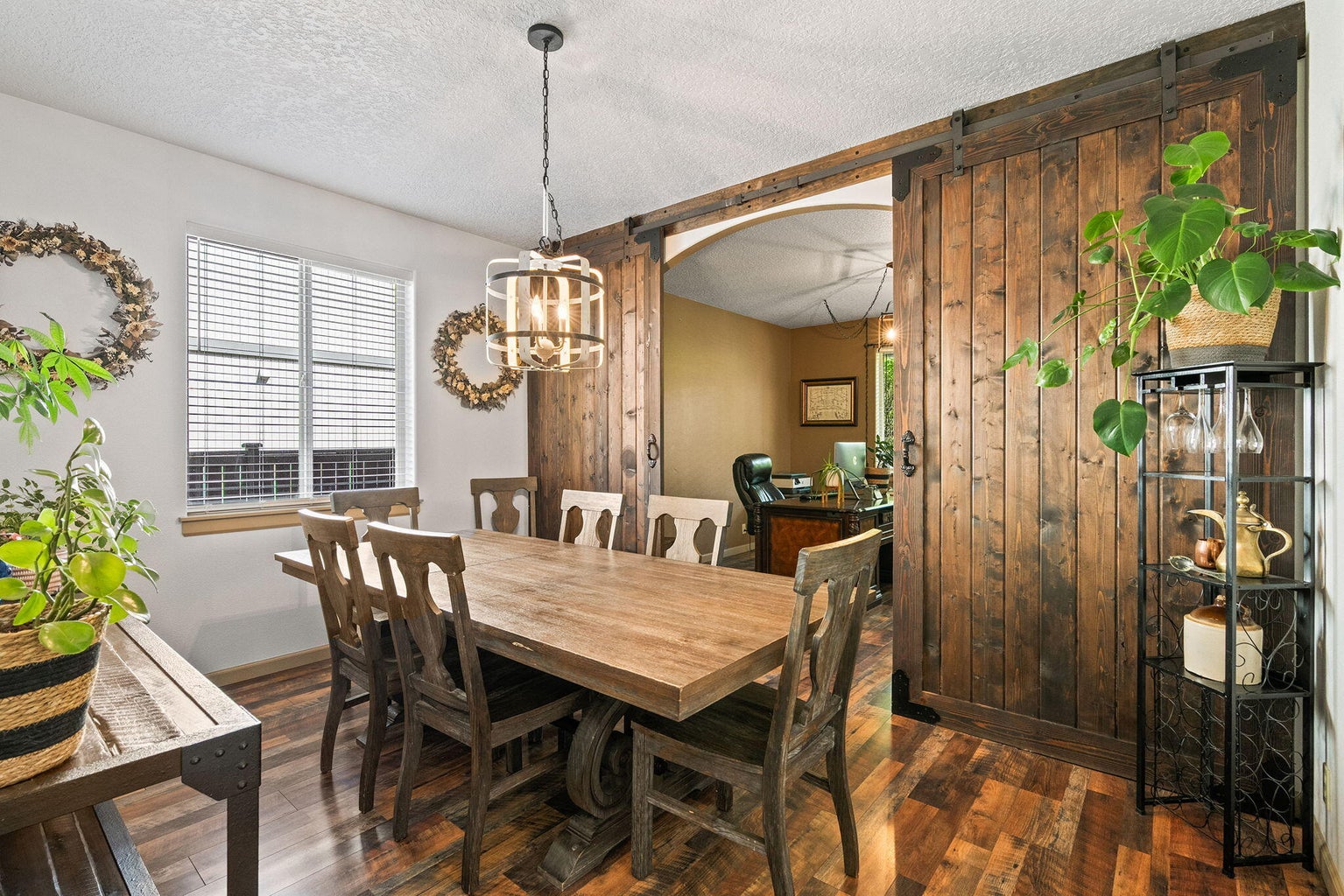 formal dining with barn wood doors
