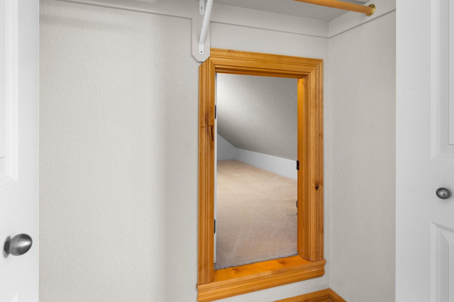 Large hidden closet behind bedroom closet