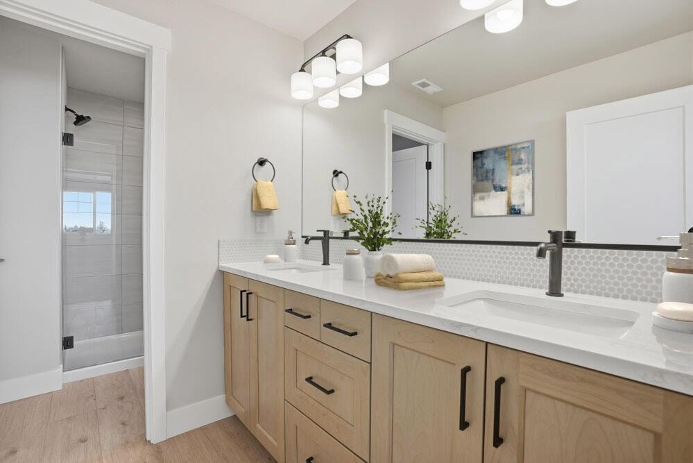 Subject property - virtual staging of primary bath.