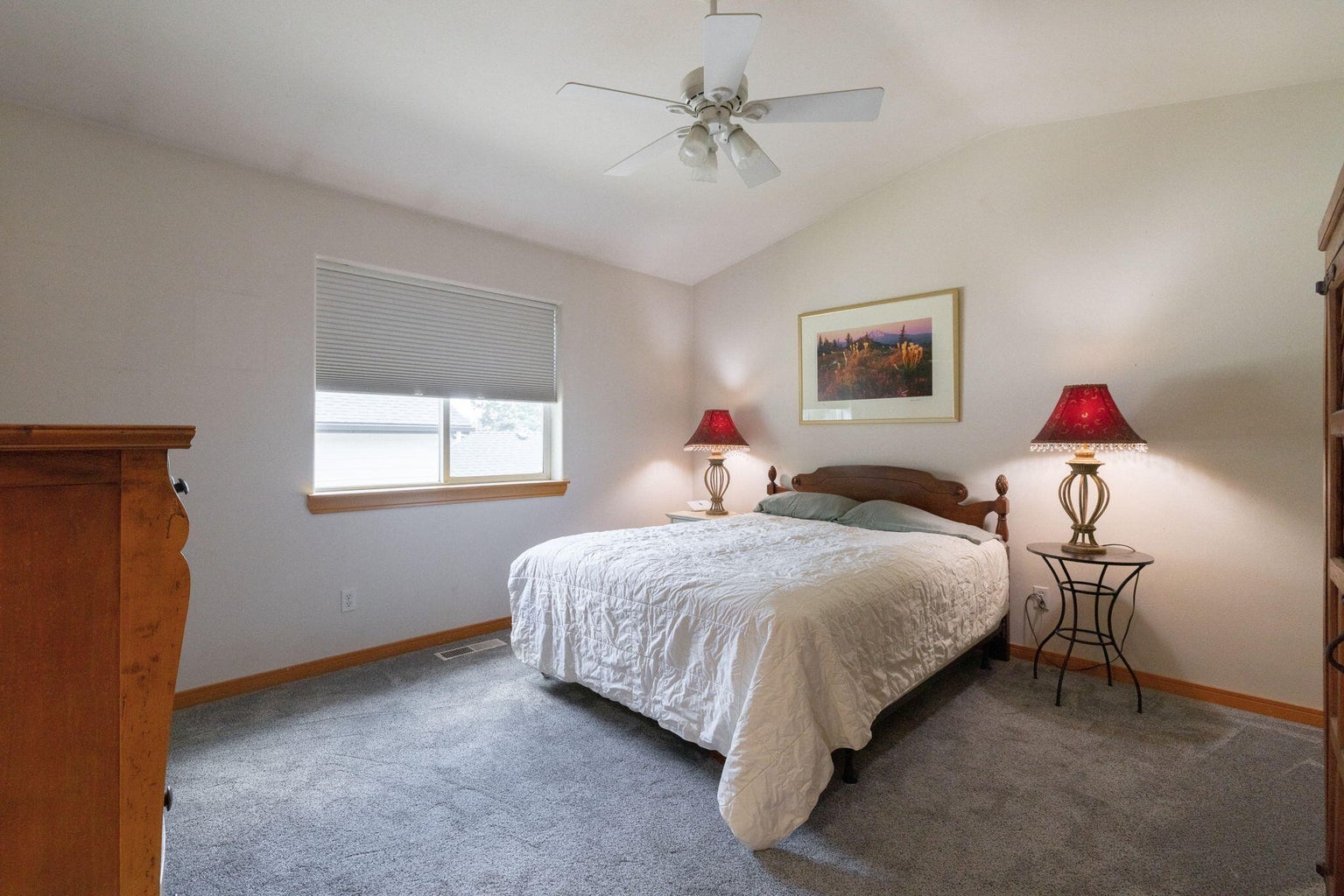 Large primary bedroom with vaulted ceilings!