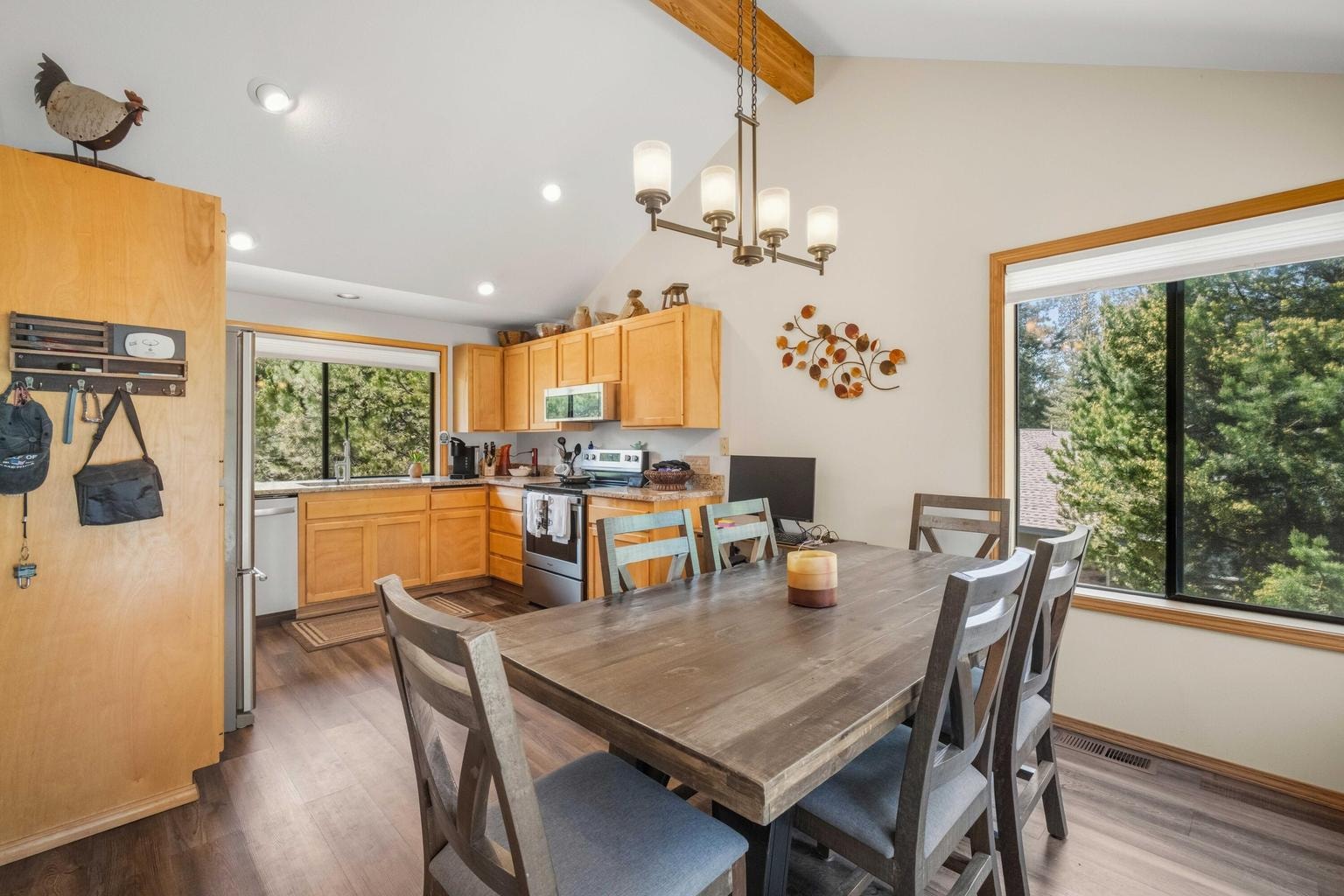 Dining space near the sliding door for easy indoor-outdoor living.