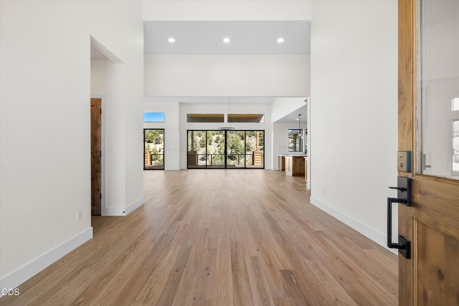 Grand Foyer with second primary and linen closet to left