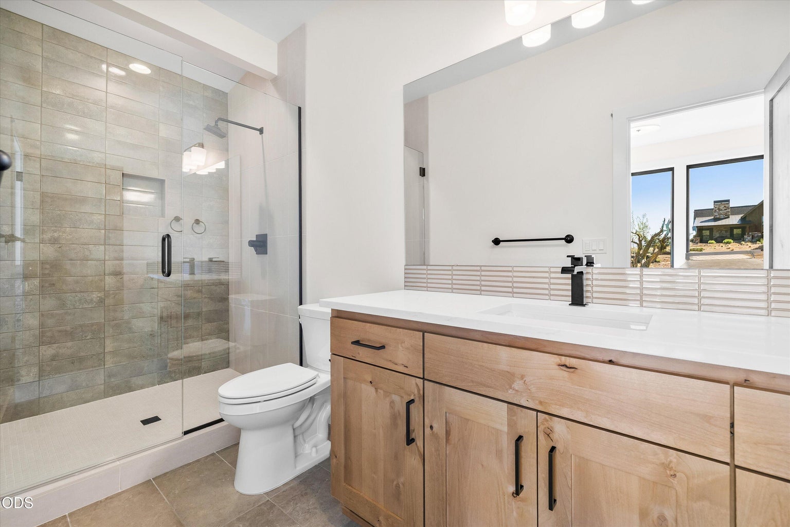 The second primary ensuite features a walk-in shower