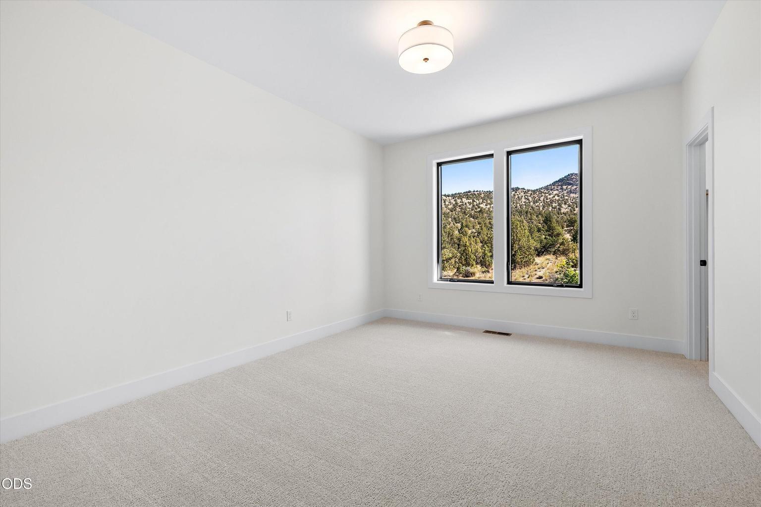The fourth bedroom located on the primary level