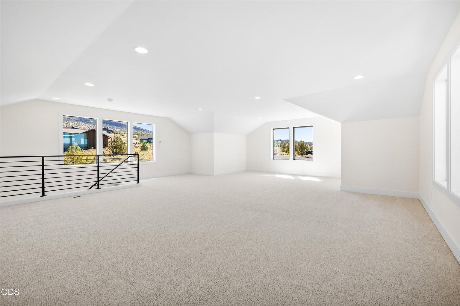 Oversized bonus room with more of the homes' featured high ceilings, extensive windows