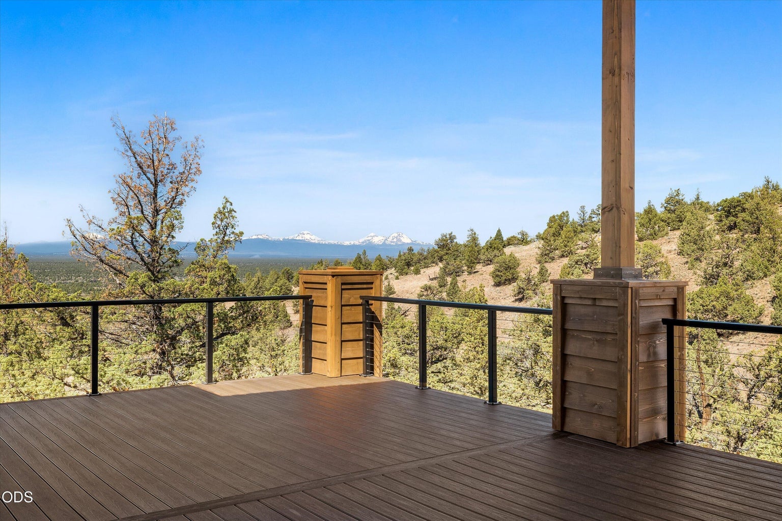 Snow-capped mountain views beyond the desert buttes