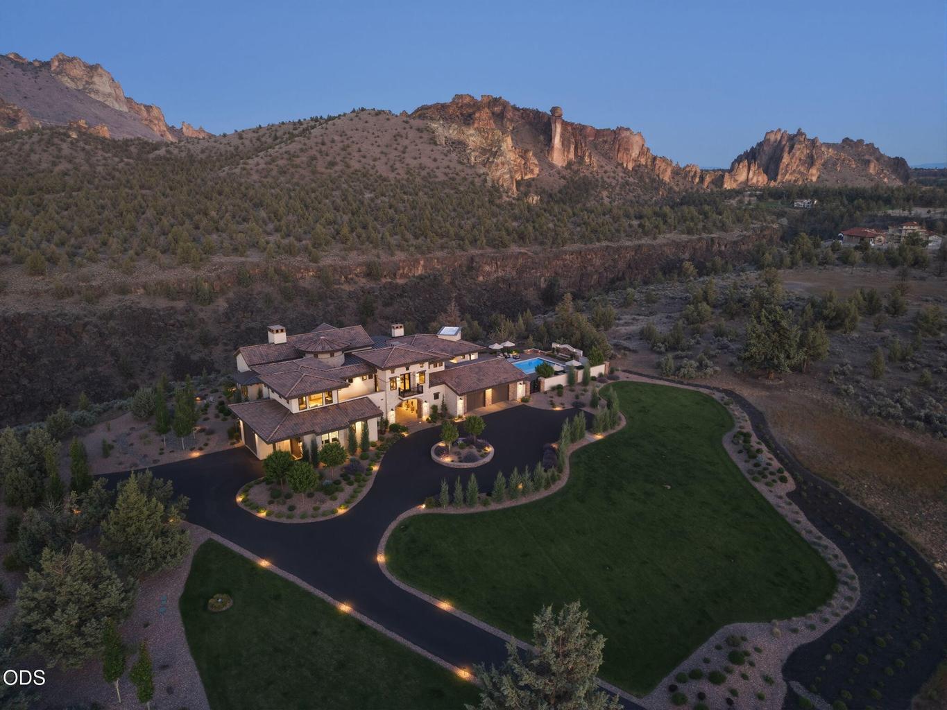 Full estate at dusk with Smith Rock backdrop