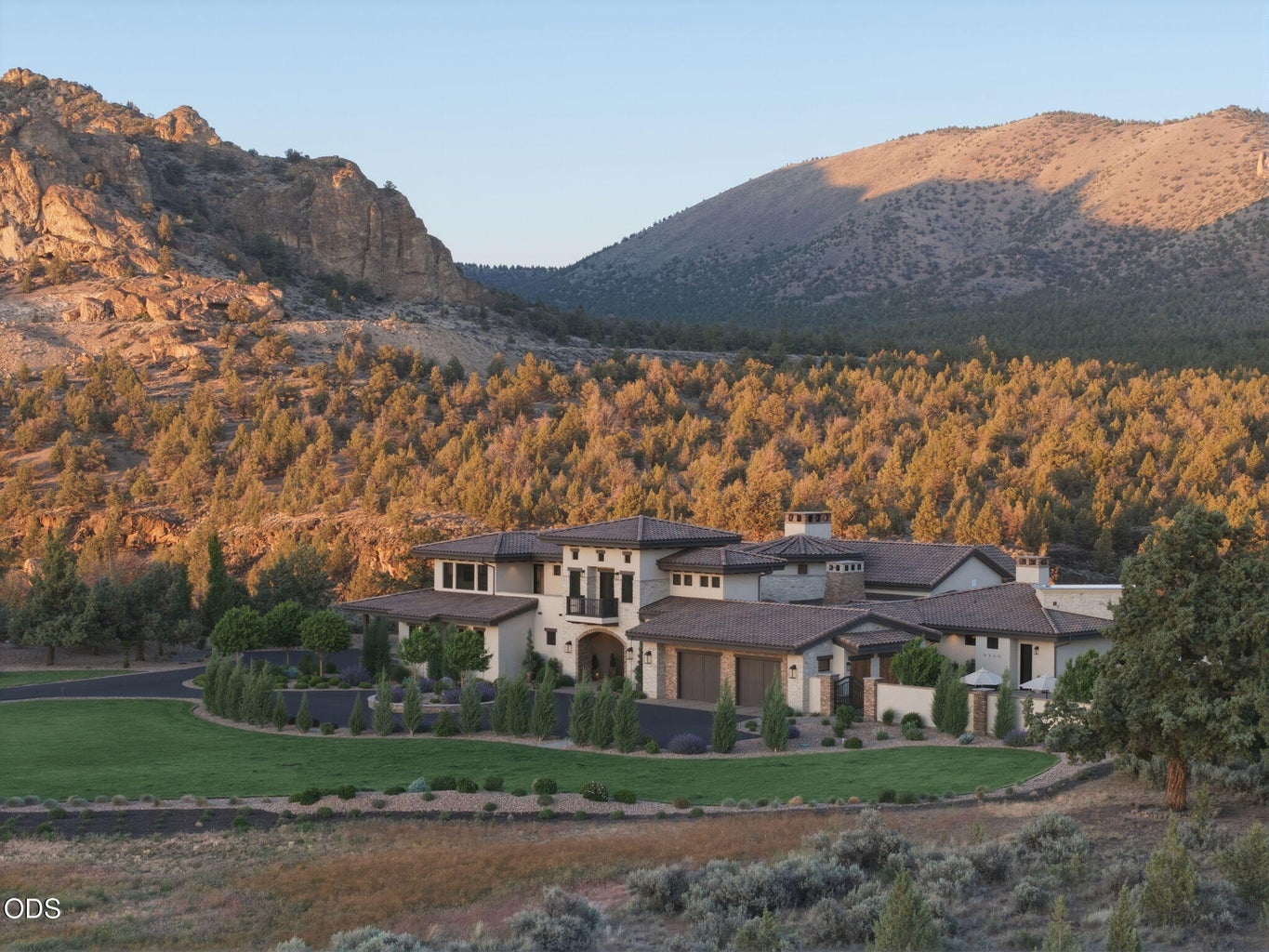 Estate set against high desert canyon ridgeline