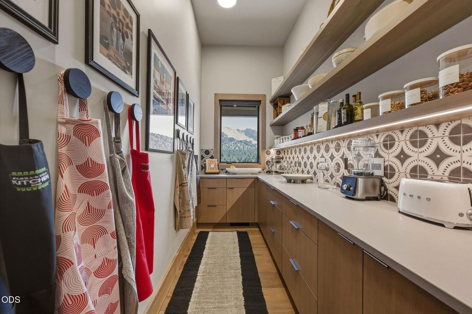 Butler's pantry, open shelving, patterned tile backsplash, Smith Rock window view