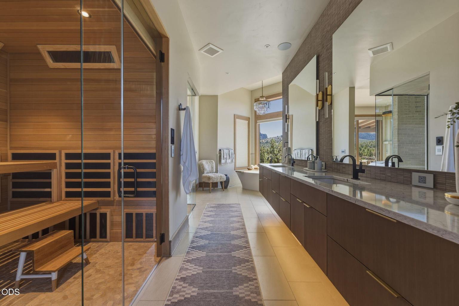 Primary bath, infrared sauna, dual vanity, soaking tub
