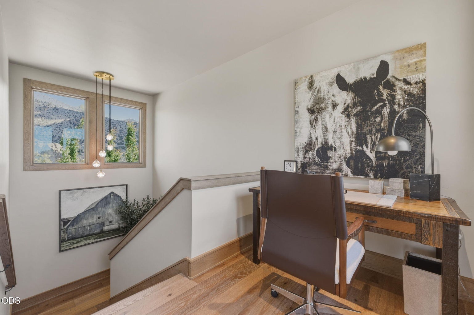 Upper landing workspace, staircase, mountain view window