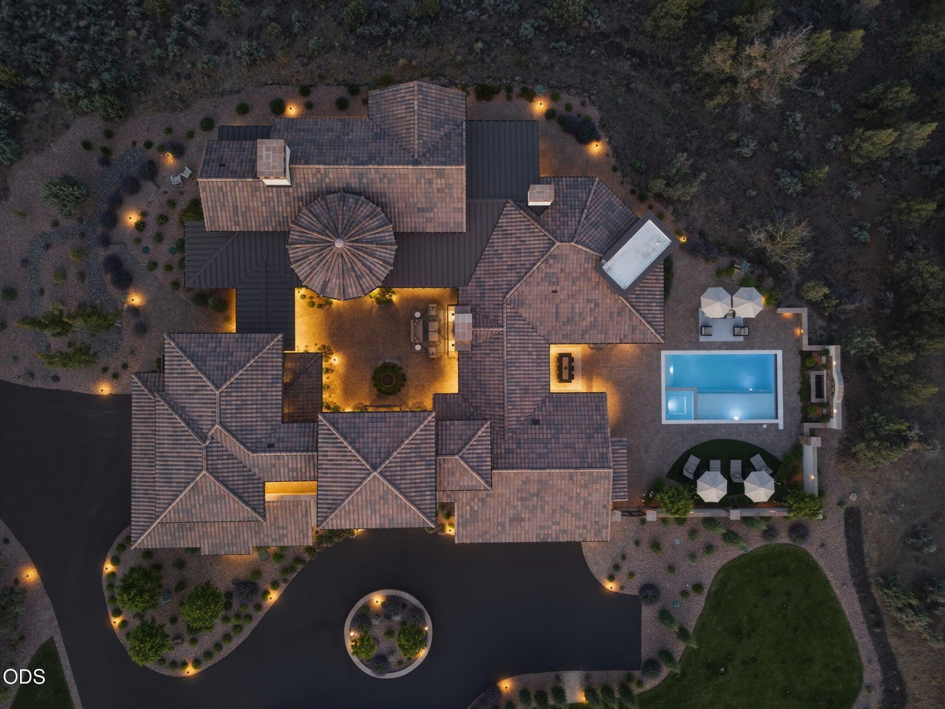Aerial overhead at dusk, full footprint of estate