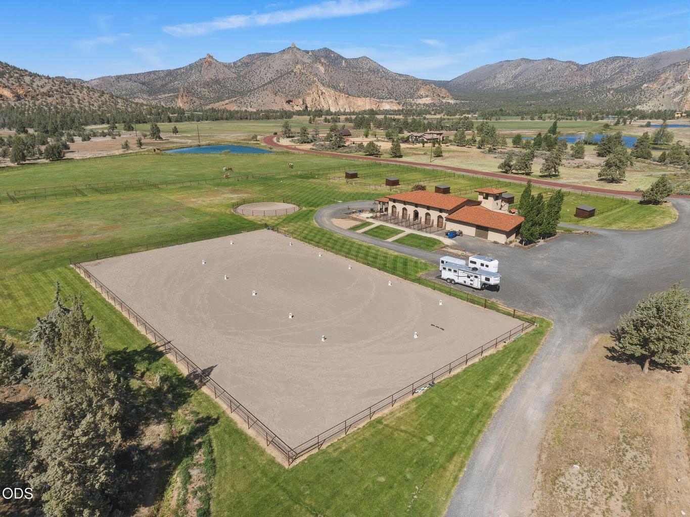 Equestrian facility within Ranch at the Canyons, arena, barn, w/ a canyon backdrop