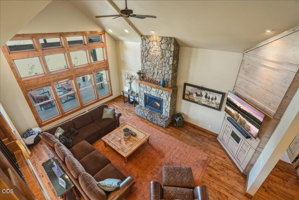 Vaulted ceilings and a versatile loft for extra living space frame a thoughtfully designed home with the primary bedroom on the main floor.