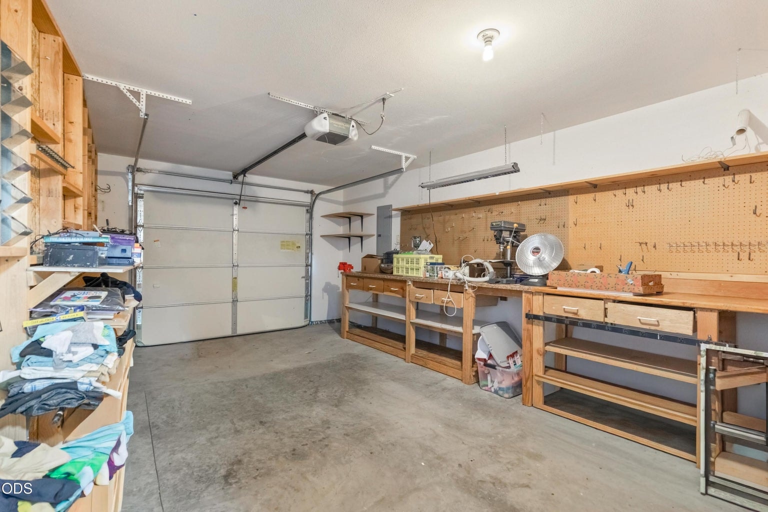 Currently separated by a wall from the 2 Car Garage to create a workshop.