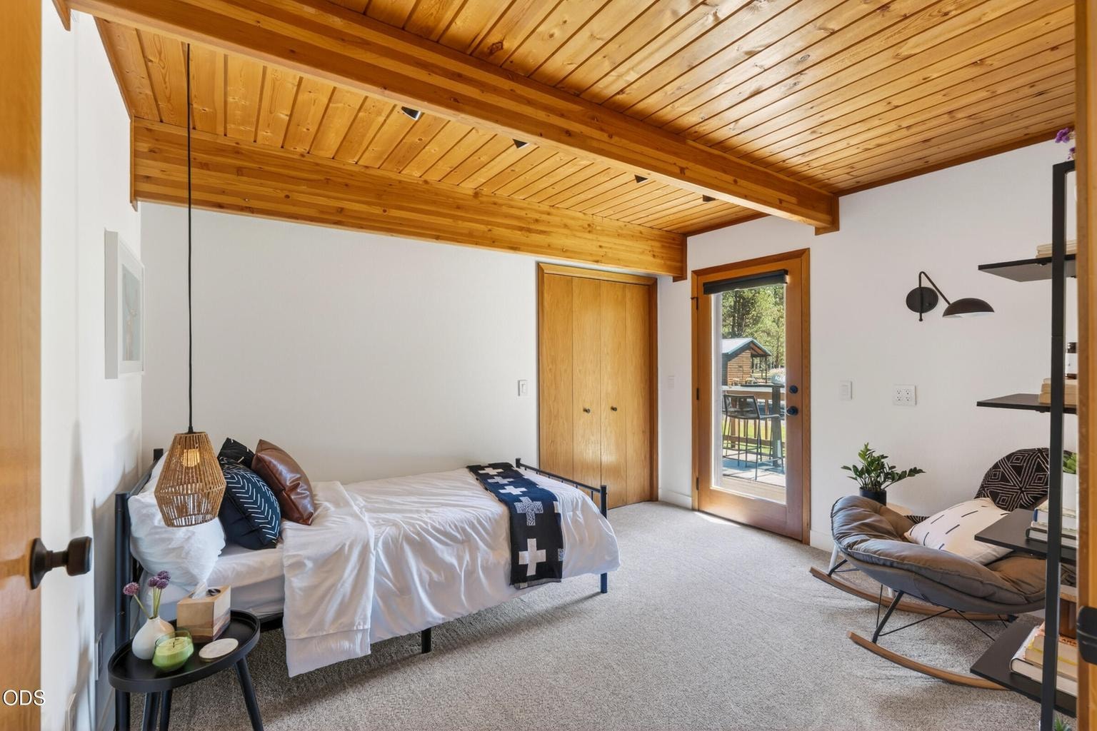 Bedroom #3 with a walk-in closet and deck