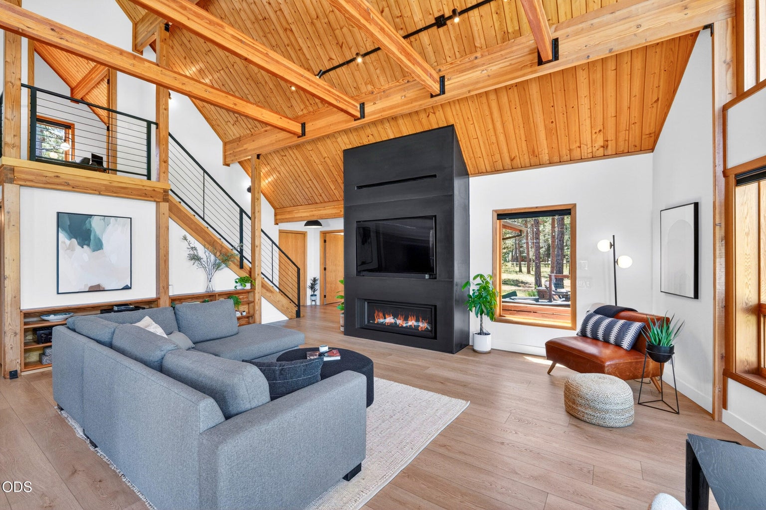 Custom made fireplace designed so the TV is at eye level.
