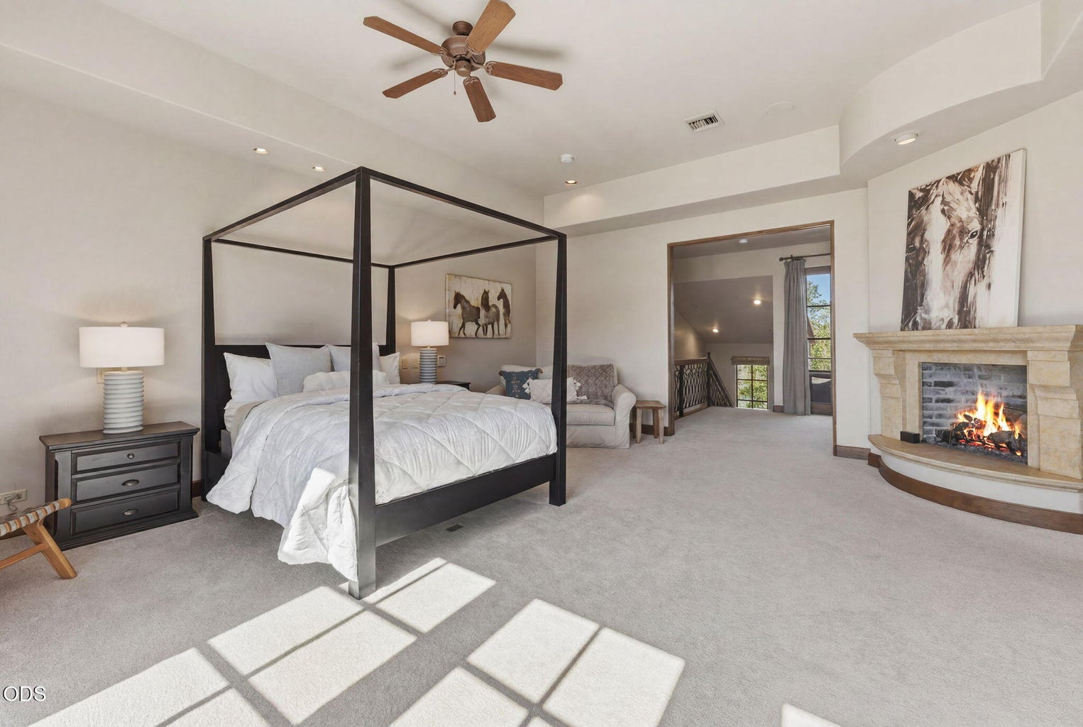 Primary ensuite with wood burning fireplace
