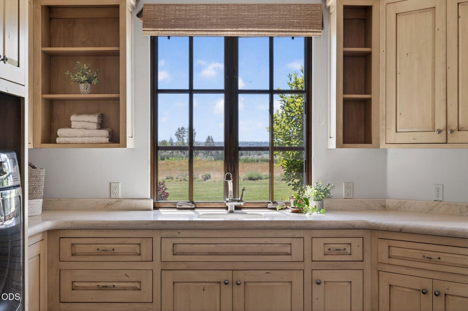 Laundry room counter/cabinets/sink & view