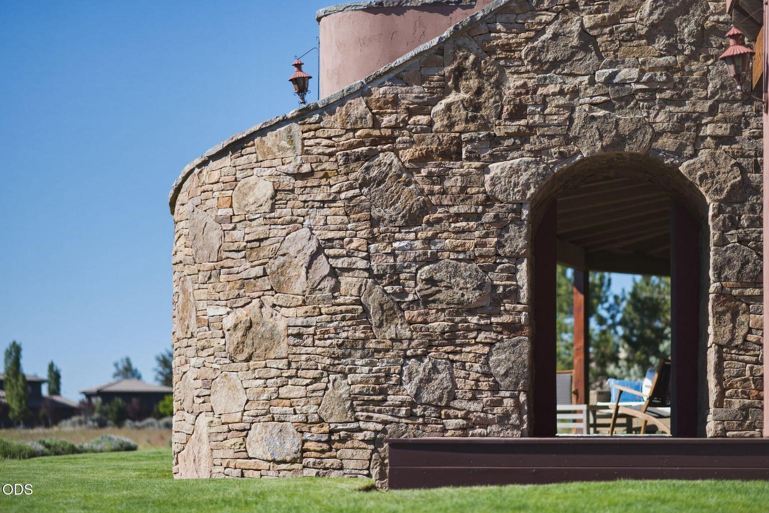 Passthrough arch and exterior of stairway to upperf loor