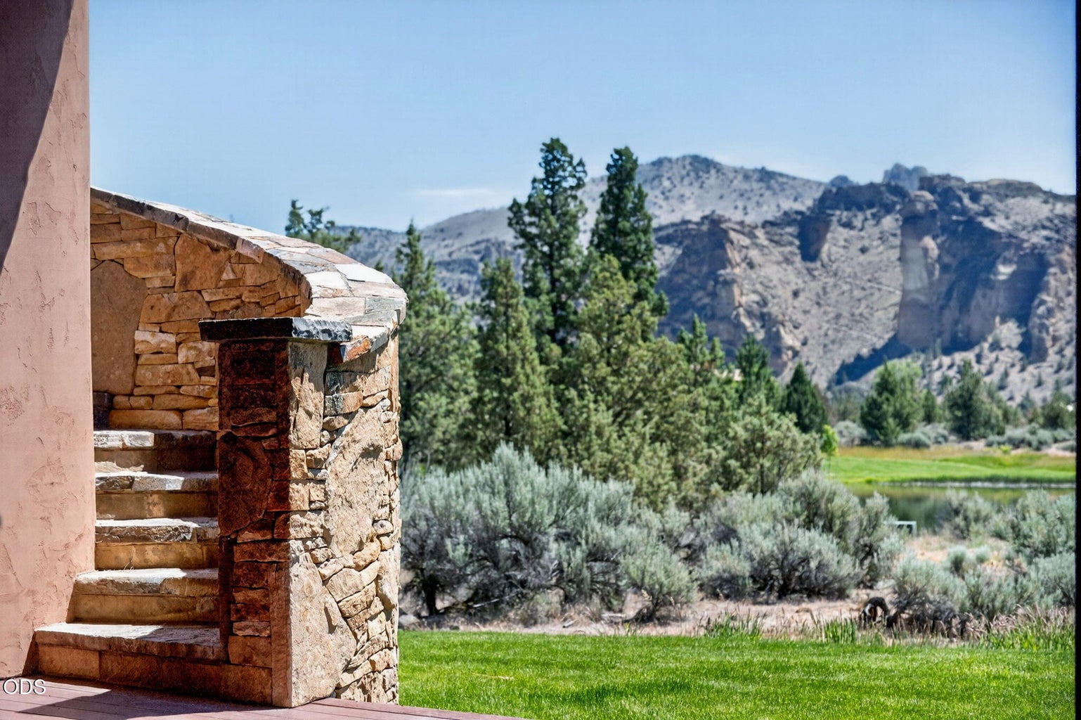 Exterior stairway to upper floor and Smith Rock views