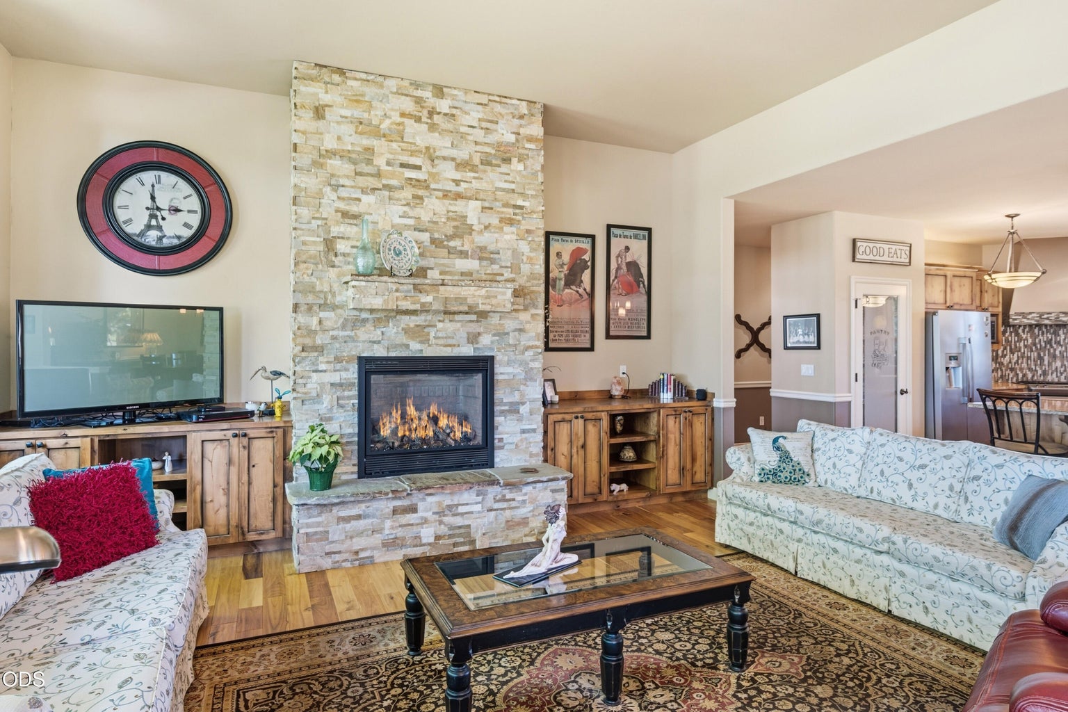 With floor to ceiling rock fireplace! So beautiful and cozy