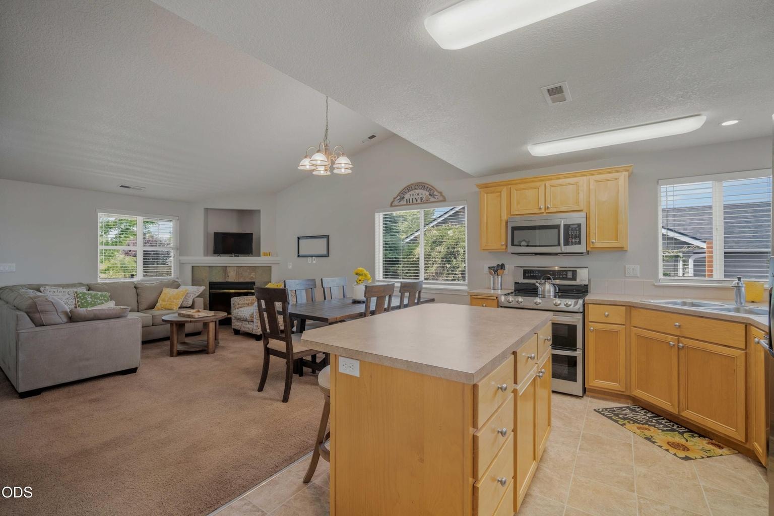 This kitchen perspective shows the easy connection to the dining and living areas, creating a functional hub for the home.